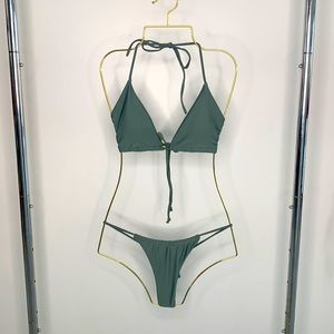 Green string bikini. Size M